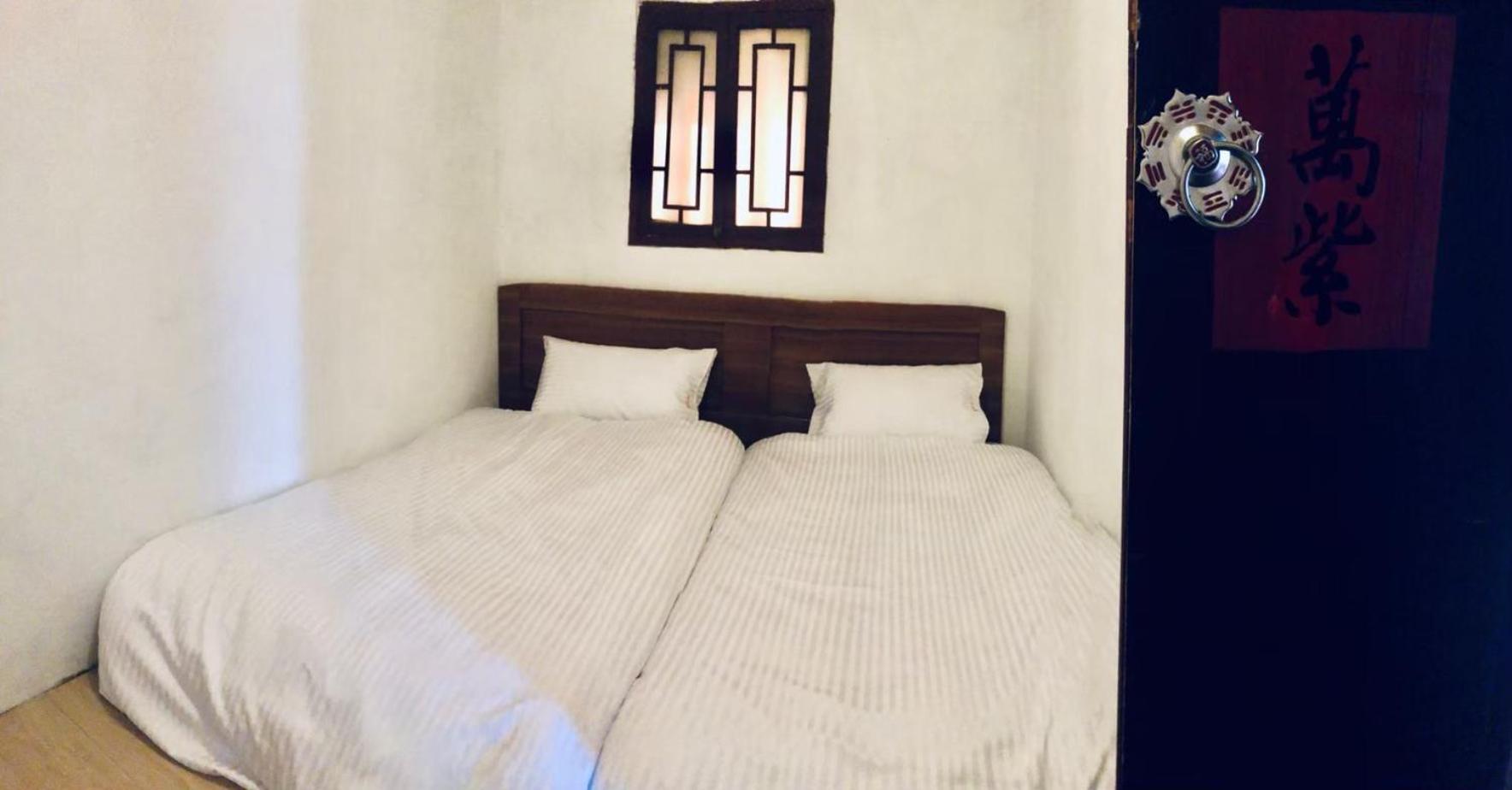 Red Tomato B&B Jinsha Bagian luar foto