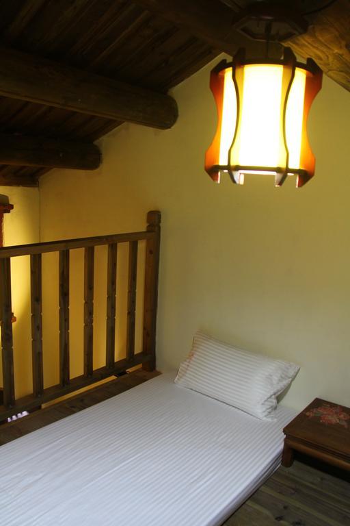 Red Tomato B&B Jinsha Bagian luar foto