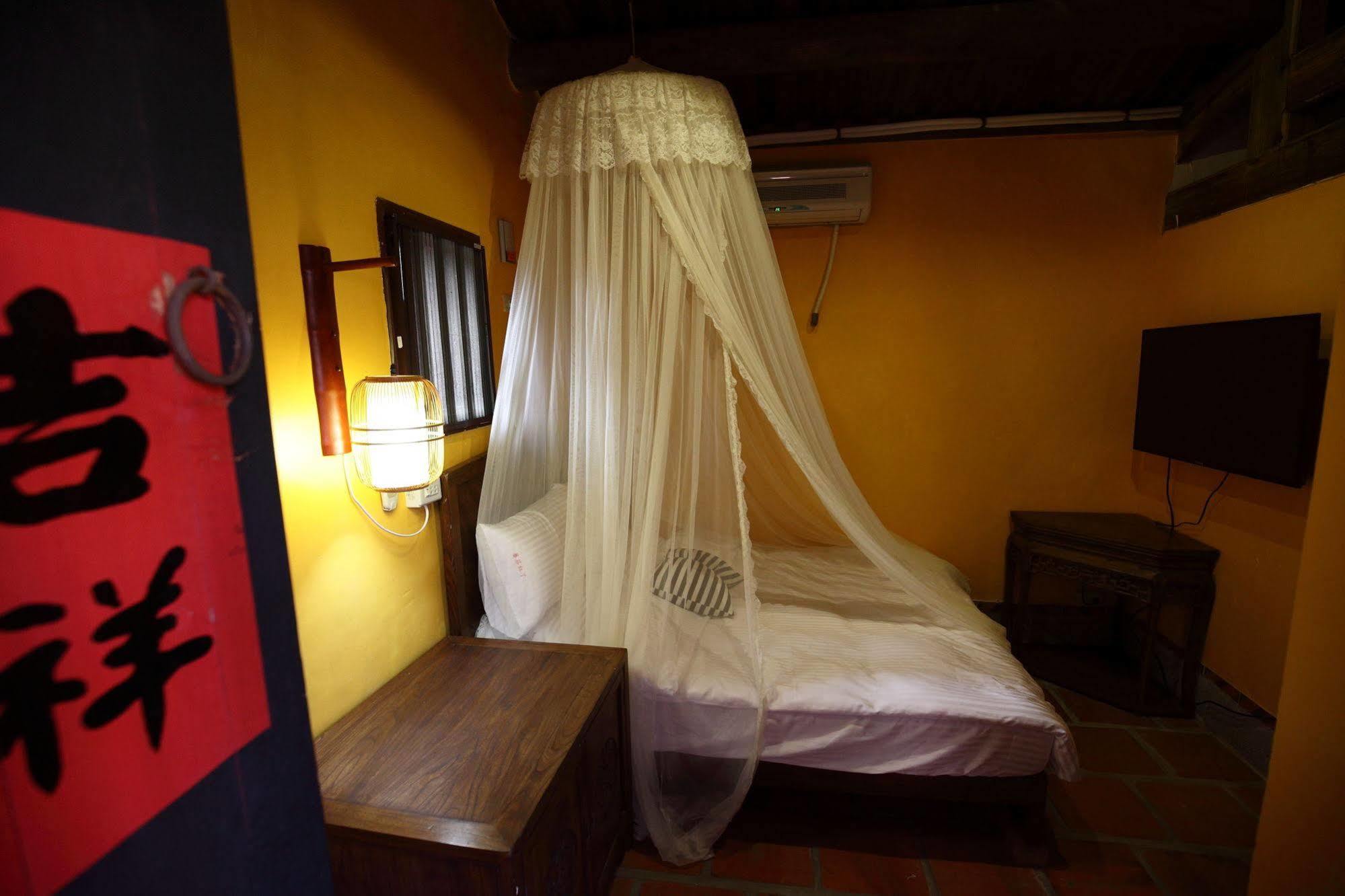 Red Tomato B&B Jinsha Bagian luar foto