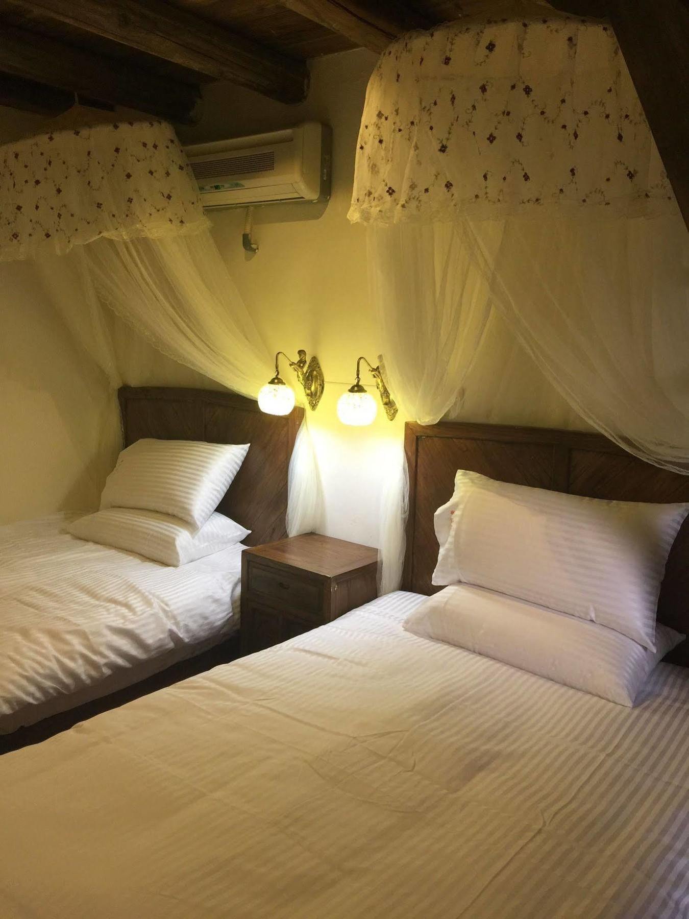 Red Tomato B&B Jinsha Bagian luar foto